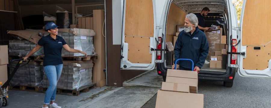 movers packing a moving van