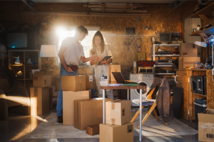 Feature Image Couple Sorting Out Their Cluttered Garage
