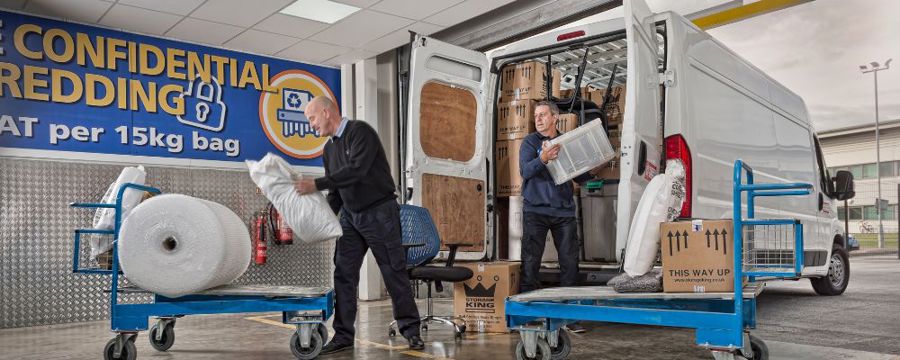 Storage King employees packing a moving van
