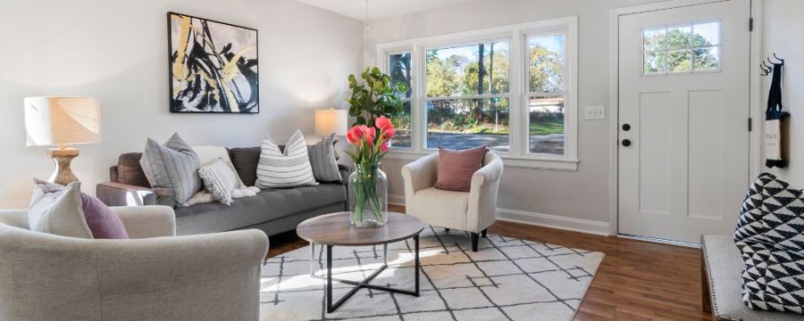 A stylish living room with interesting patterns and experimental design elements