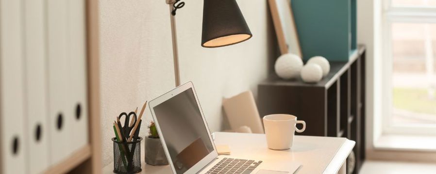 Home office with a clip on lamp
