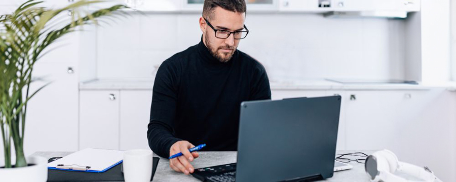 Man researching warehouse options