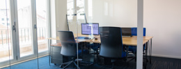 Empty Office In Glass Boardroom