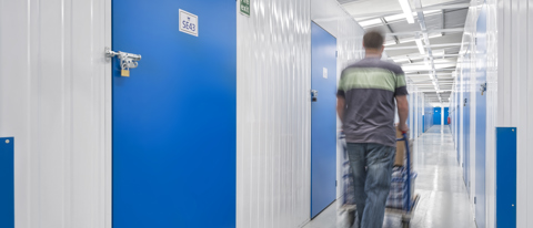 Customer in a Storage Facility Corridor