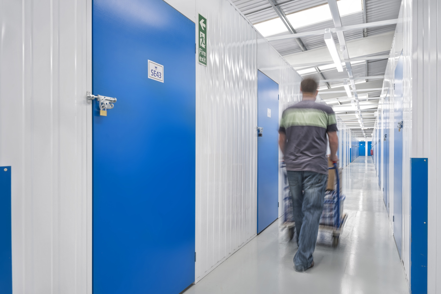 Customer in a Storage Facility Corridor
