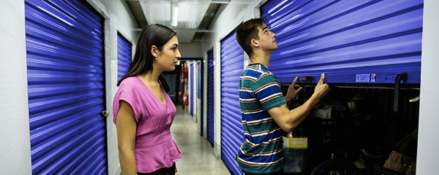 Student opening their storage unit at one of Storage King's facility's