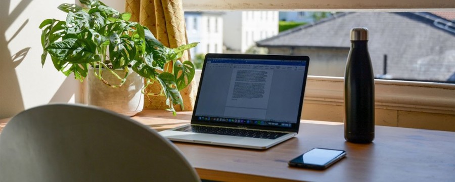 home office with window overlooking city