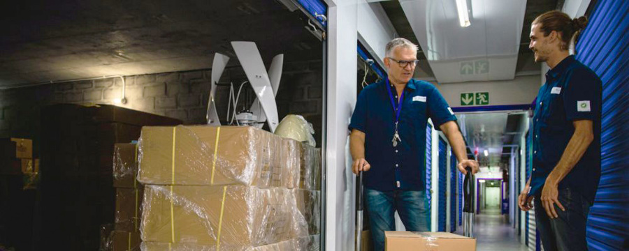 Business owners storing their items in the warehouse space
