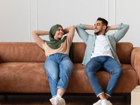 Couple Checking The House Out After Packing Up The House