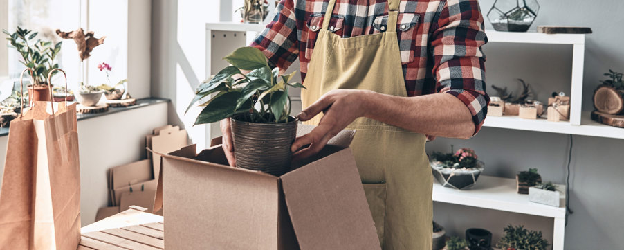 florest-business-owner-packing-things-into-storage