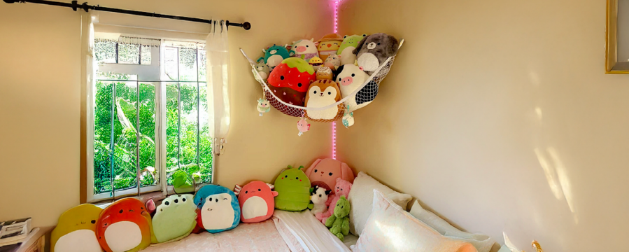 DIY hammock being used to store plush toys