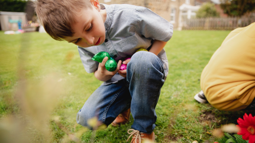 Boy holding easter eggs